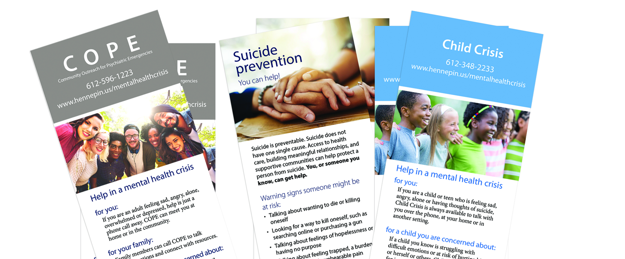 COPE, Child Crisis, and suicide prevention brochures sitting on a table
