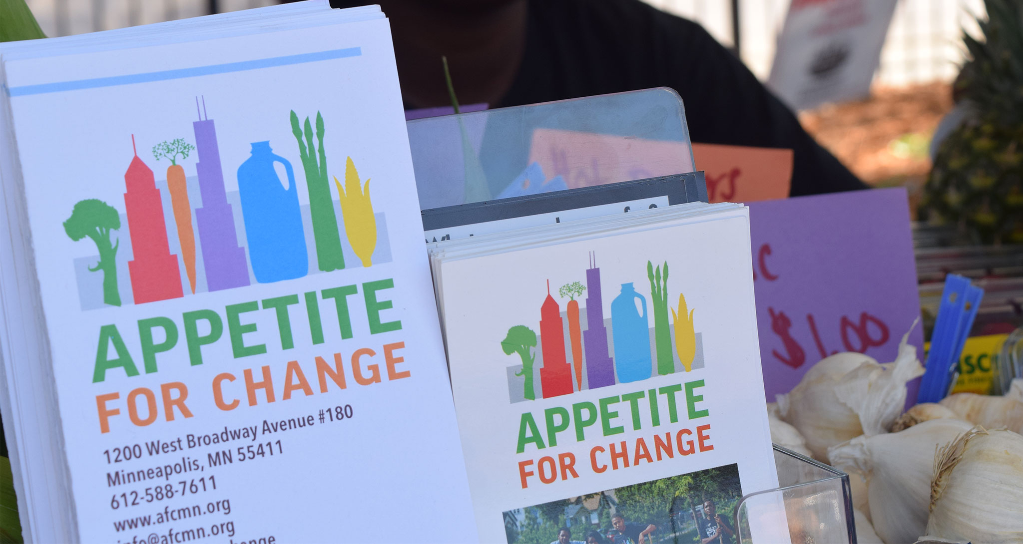 Appetite for change signs at the farmers market