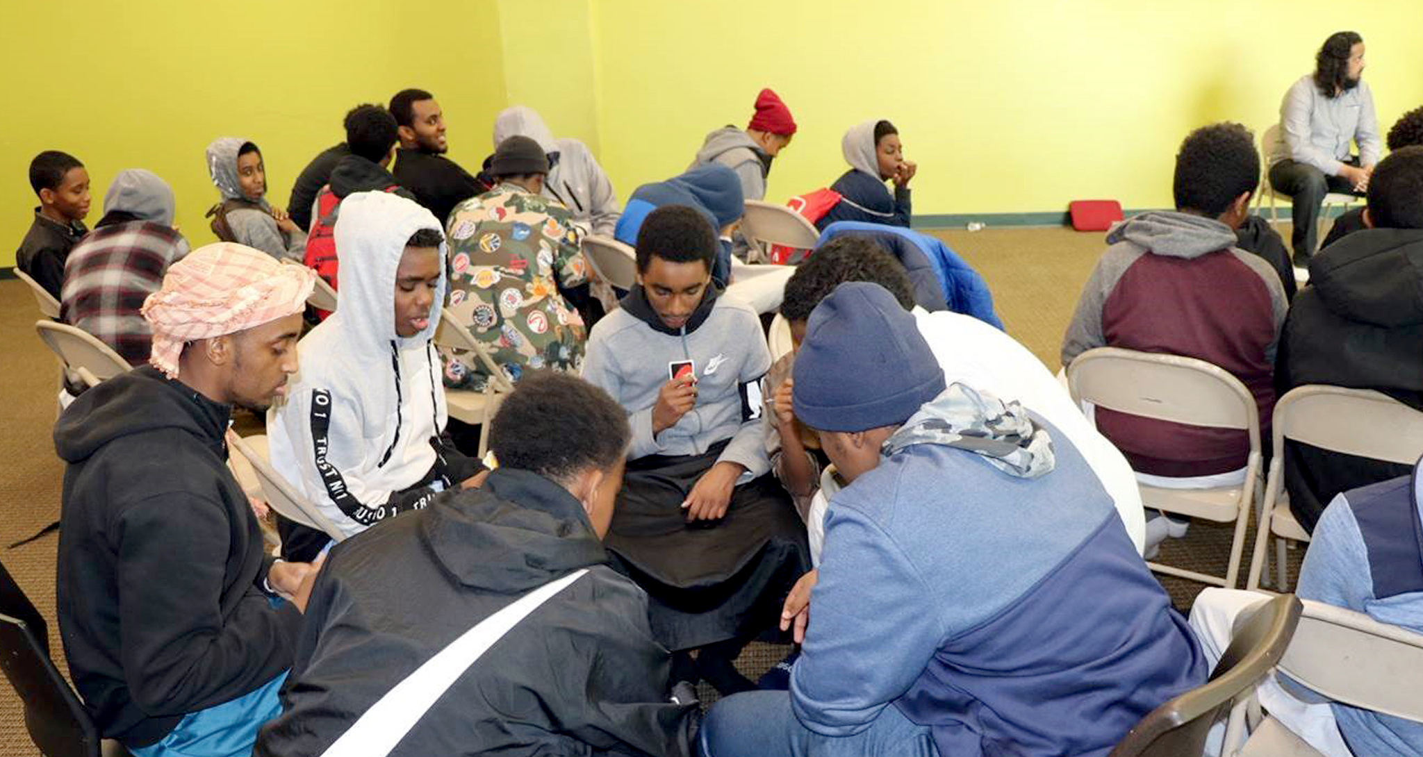 Staff from Metro Youth Diversion Center work with youth